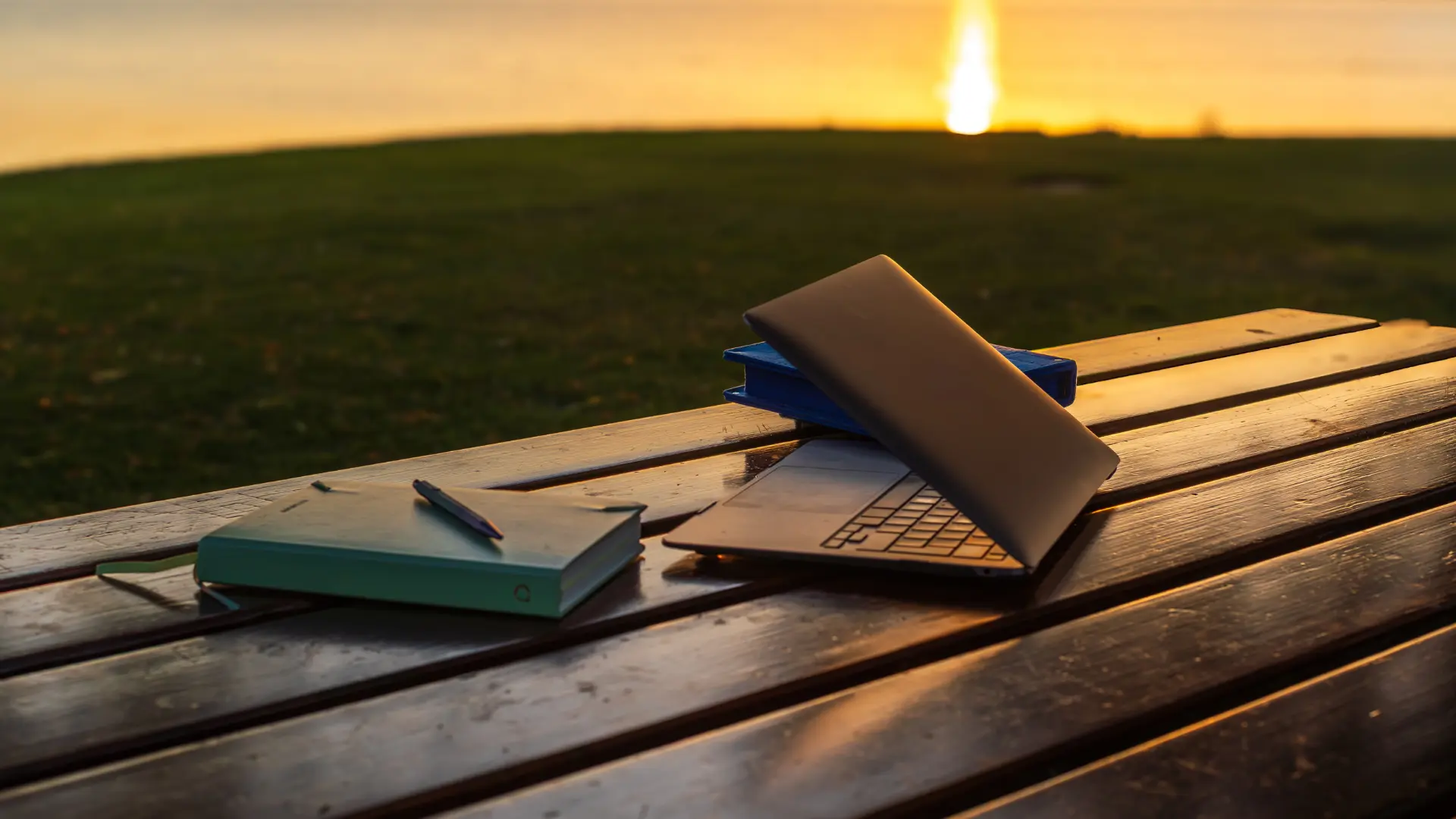 Laptop on a table located near a lake in Switzerland