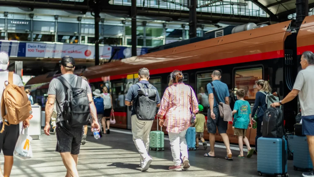 photo with people at train and luggage (like going to business events)