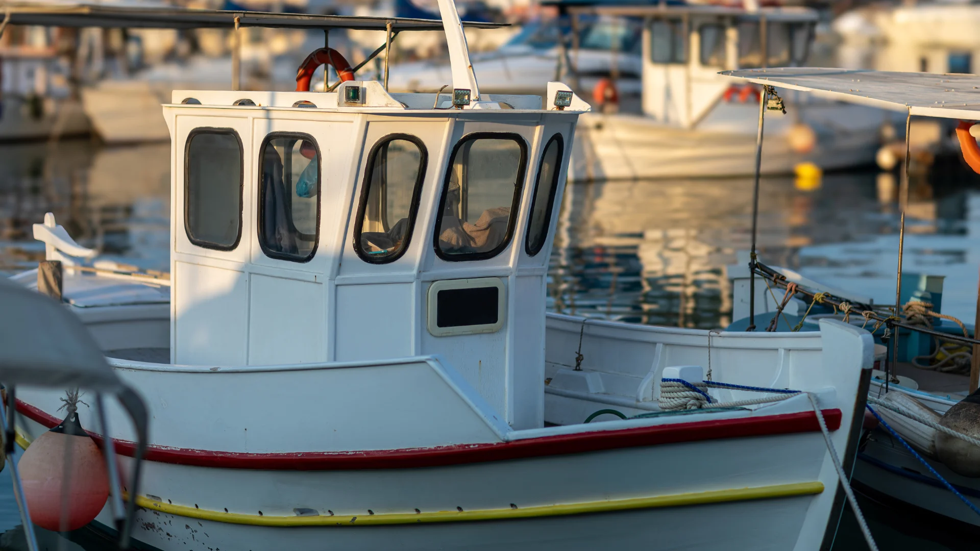 the photo with the little boat (suggesting familiar setting)